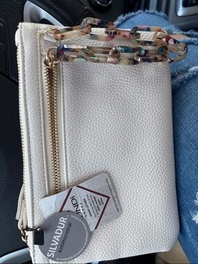 Mundi CARES Vegan Leather White Textured Wristlet Clutch with Multicolor Chain